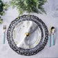 Black vinyl placemats on a table setting with white plates and silver utensils.