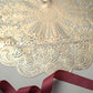 Gold vintage floral lace placemat with non-slip design.