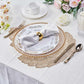 Gold metallic fall leaf vinyl placemats on a dining table setting.