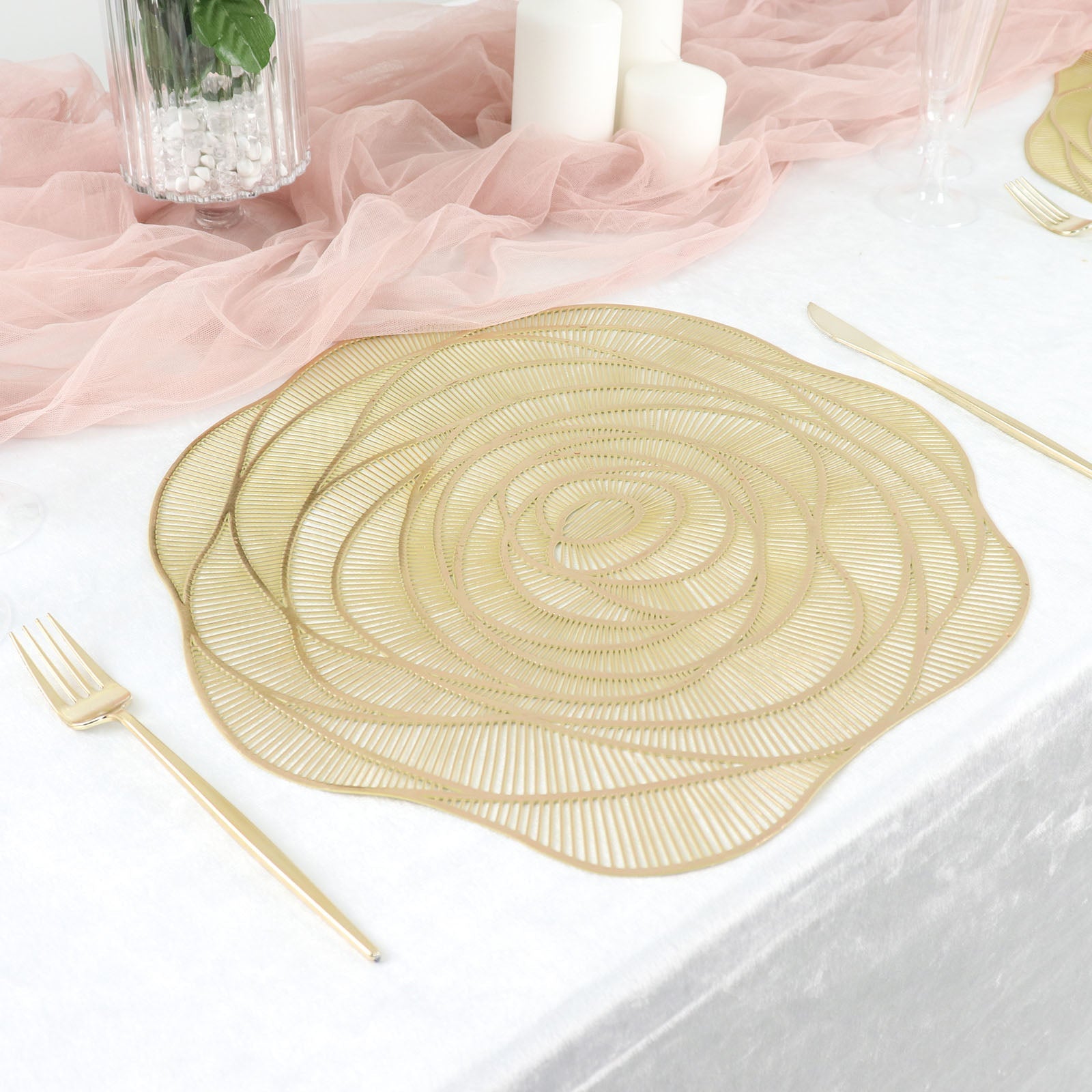 Metallic gold round vinyl placemat with rose flower design on dining table.