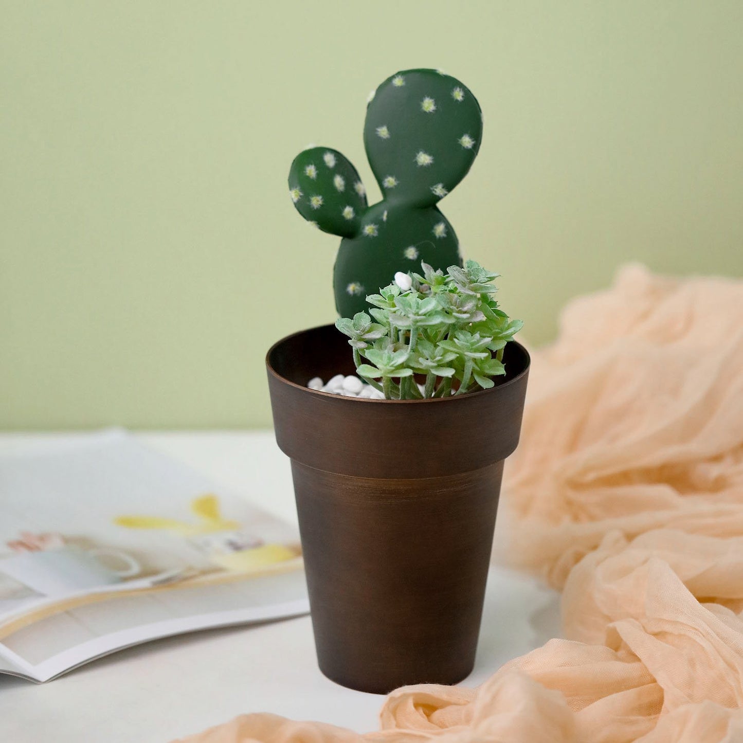 6" rustic brown medium flower plant pot with greenery and cactus.