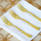 7" metallic gold heavy duty plastic forks on a white napkin.