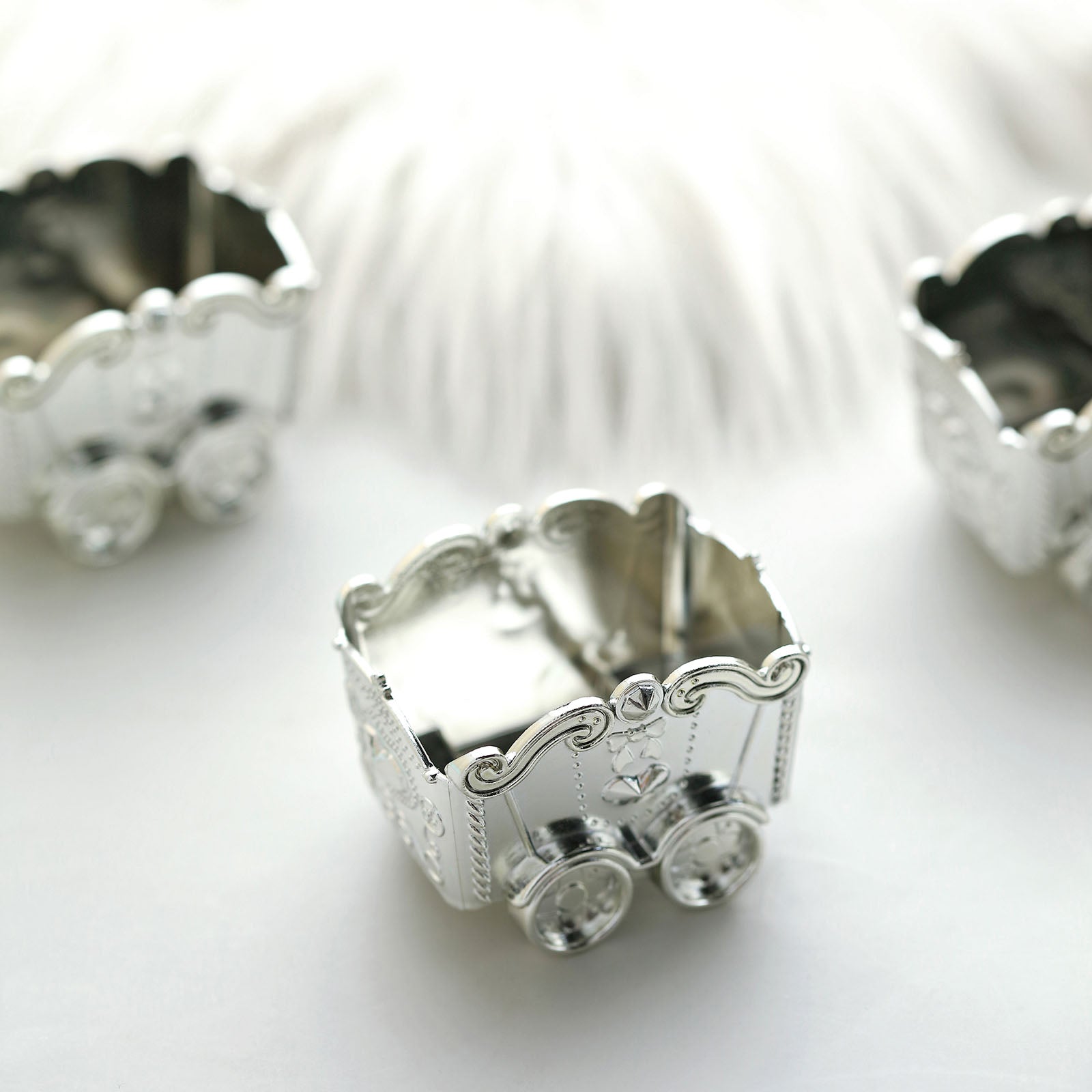 Silver chariot party favor gift boxes for candy treats.