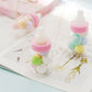 Pink baby bottle candy containers for party favors.