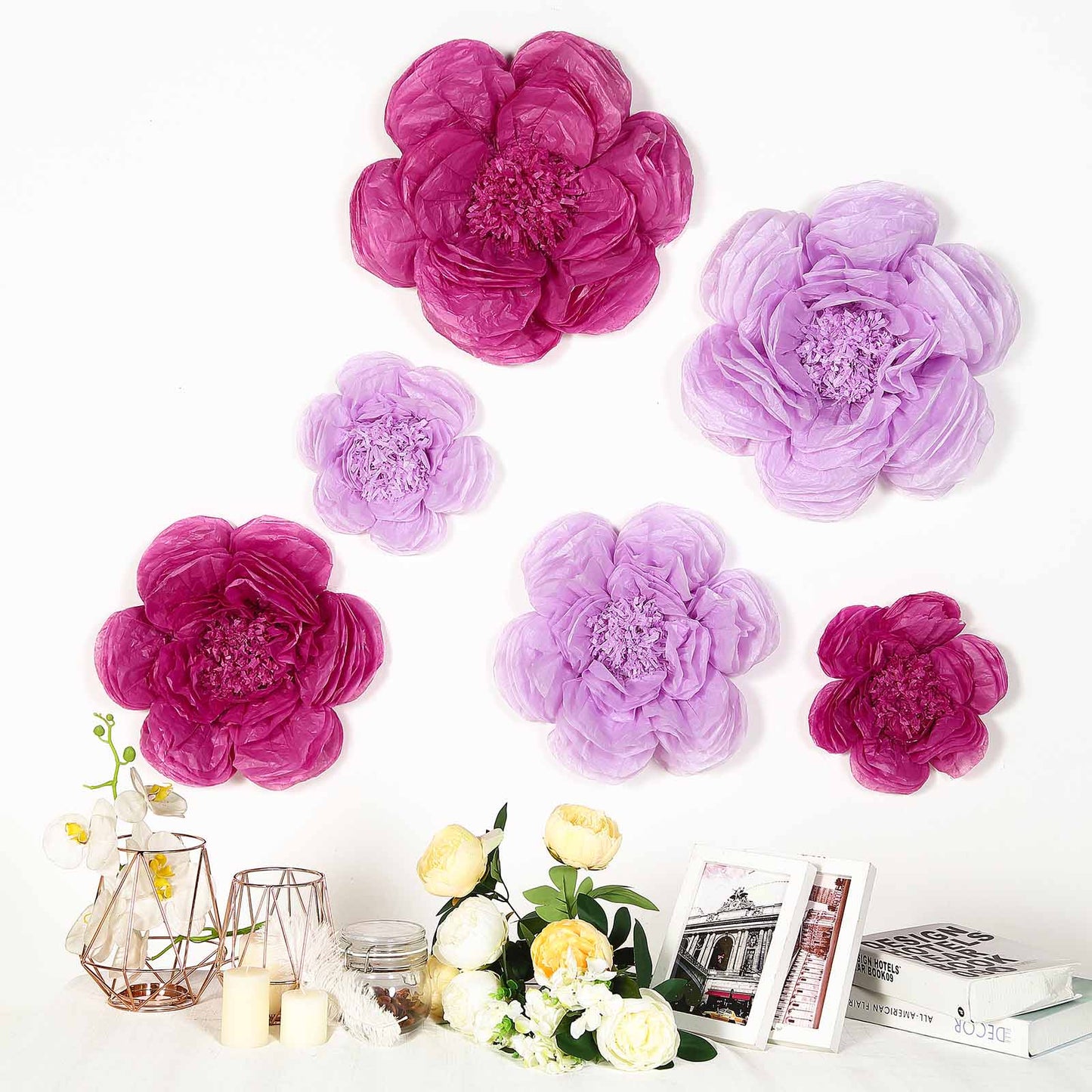 Lavender and lilac giant paper flowers in assorted sizes.