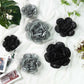 Pack of 6 black and charcoal gray peony paper artificial flowers.