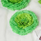 Mint green 3D giant paper flower, perfect for backdrops and decorations.