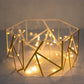 Clear gold acrylic hexagonal cake box stand with hollow bottom and geometric design.