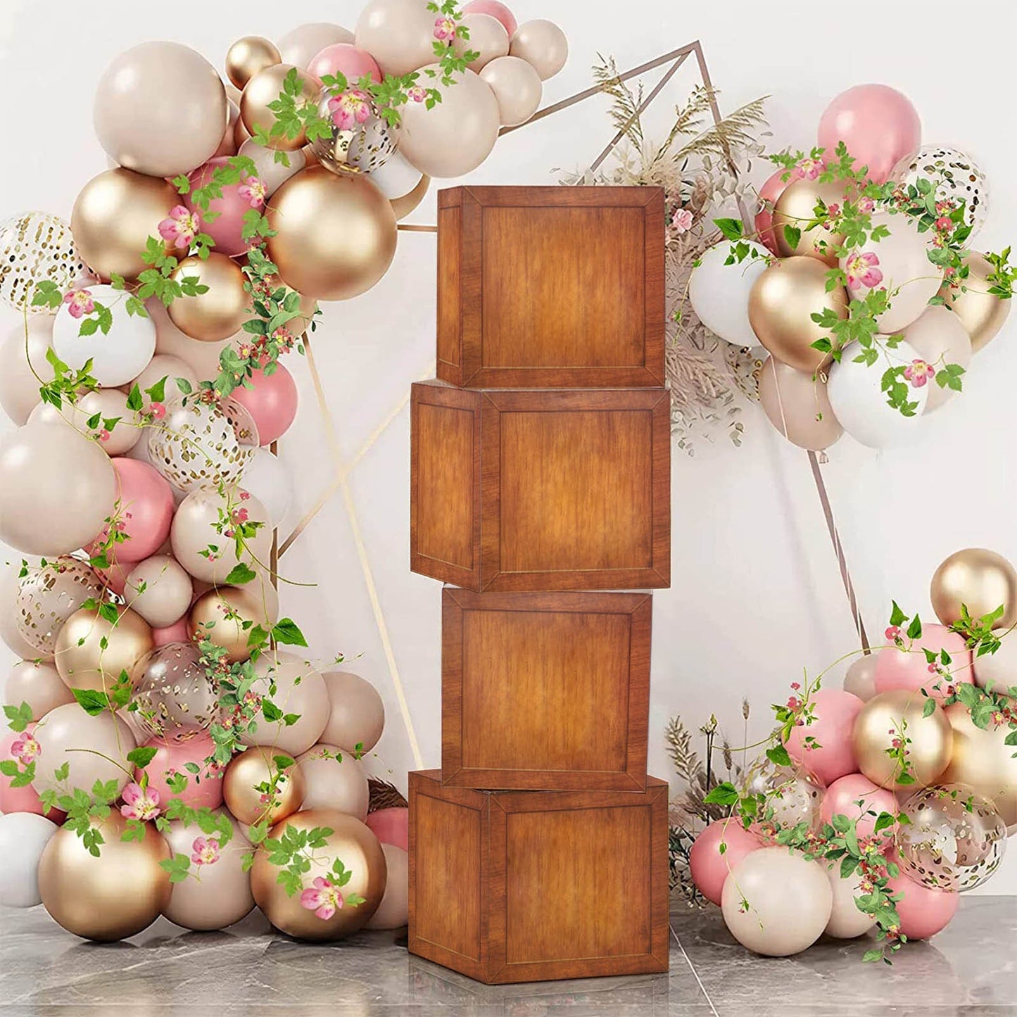 Wood grain brown balloon boxes for boho baby shower decorations.