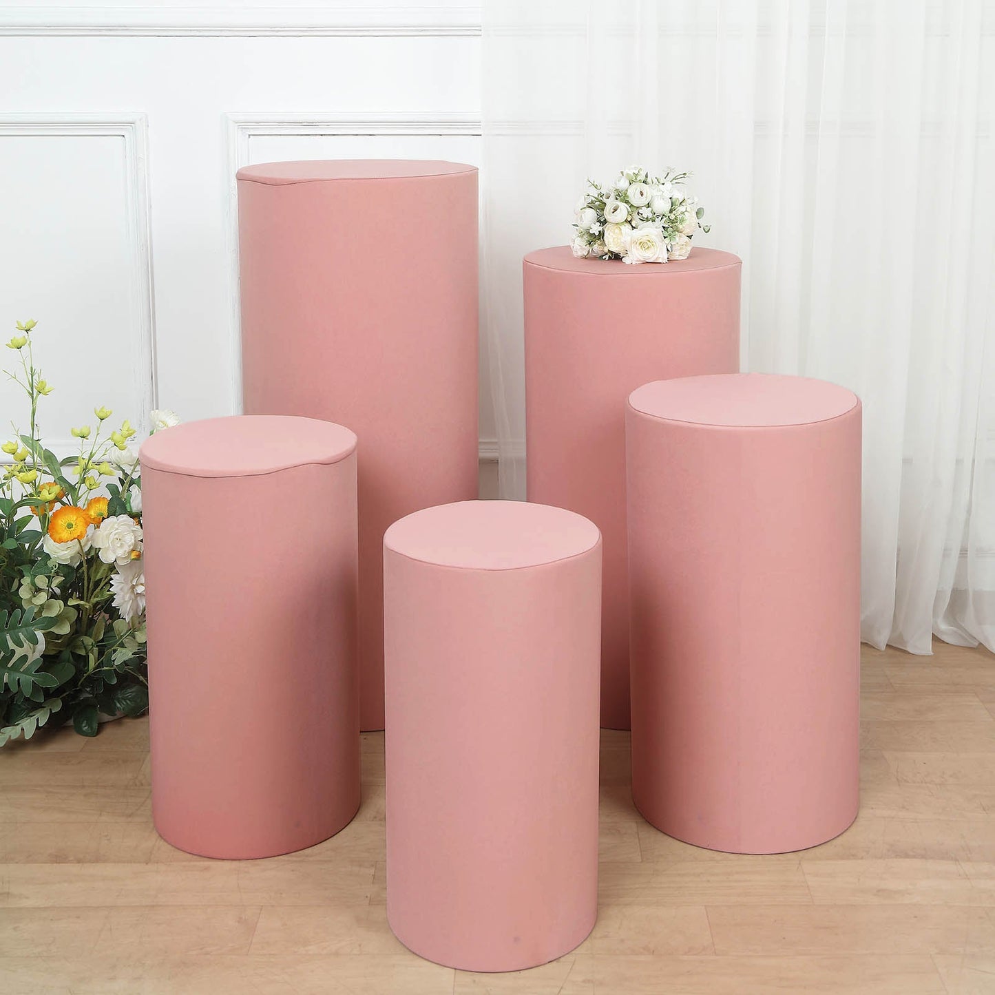 Dusty rose spandex pedestal stand covers set of 5 for events.