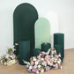 Emerald green spandex pedestal stand covers with floral arrangement.