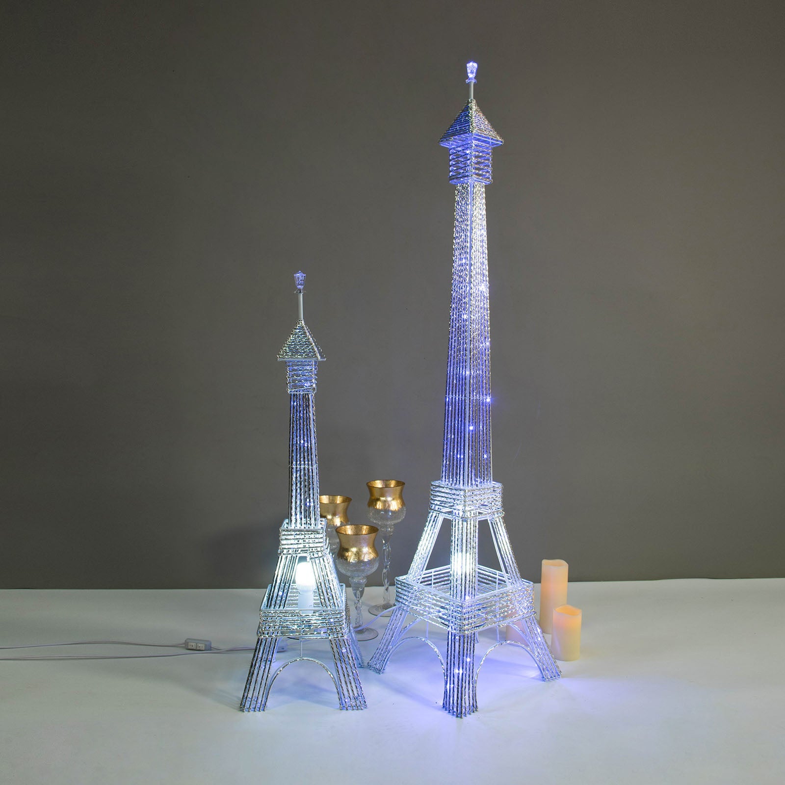 Color changing LED metal Eiffel Tower in blue light.