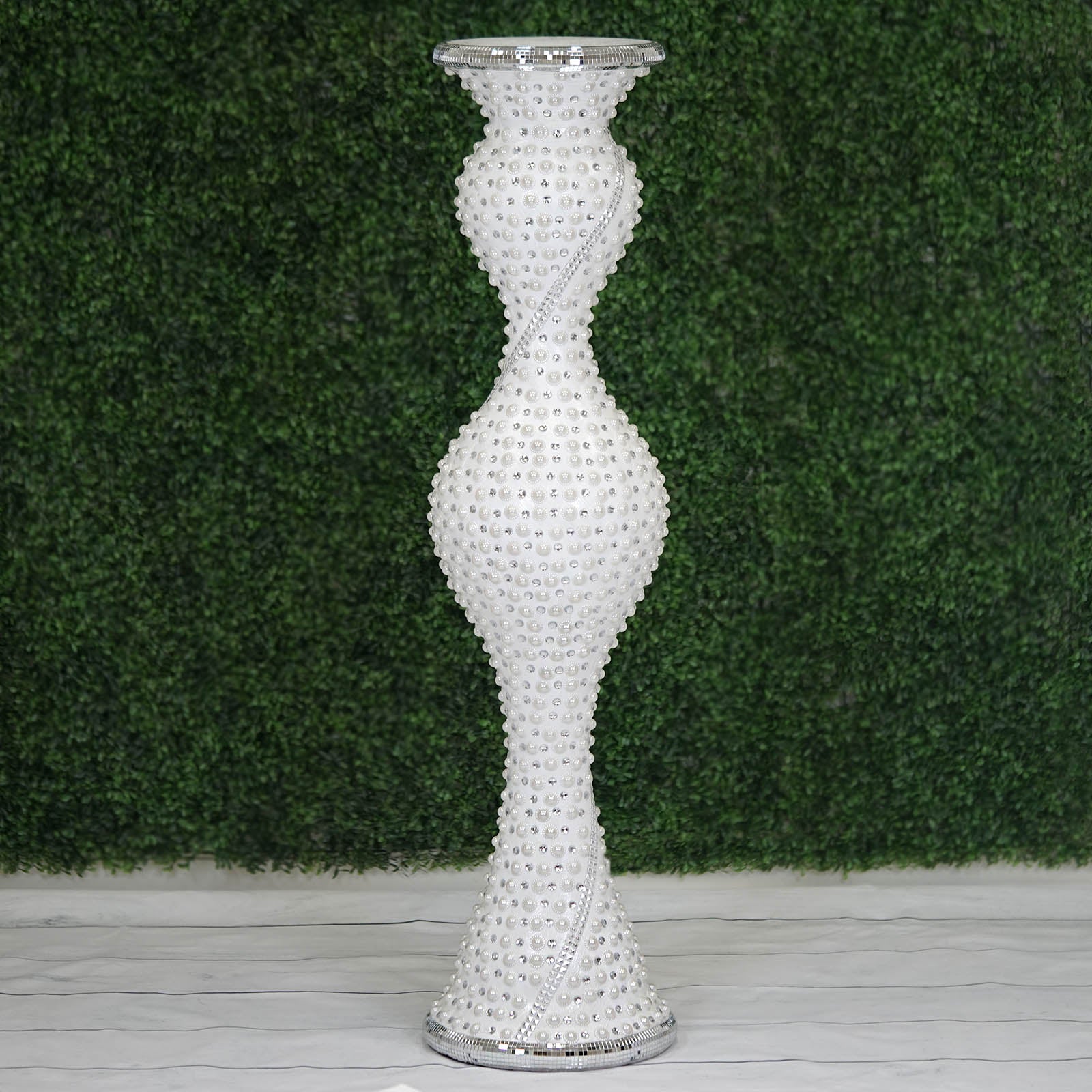 White pearl studded floor vase with mosaic design.