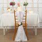 Beige leaf petal taffeta ribbon sash on a decorated chair at a festive table.