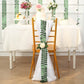 Green leaf petal taffeta ribbon sash on a decorated chair.