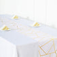 9ft white and gold geometric pattern table runner on a dining table.