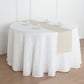 Beige linen table runner on a round table setting.