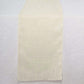 Ivory linen table runner with slubby texture, wrinkle resistant.