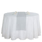 Silver linen table runner on a round white table setting.