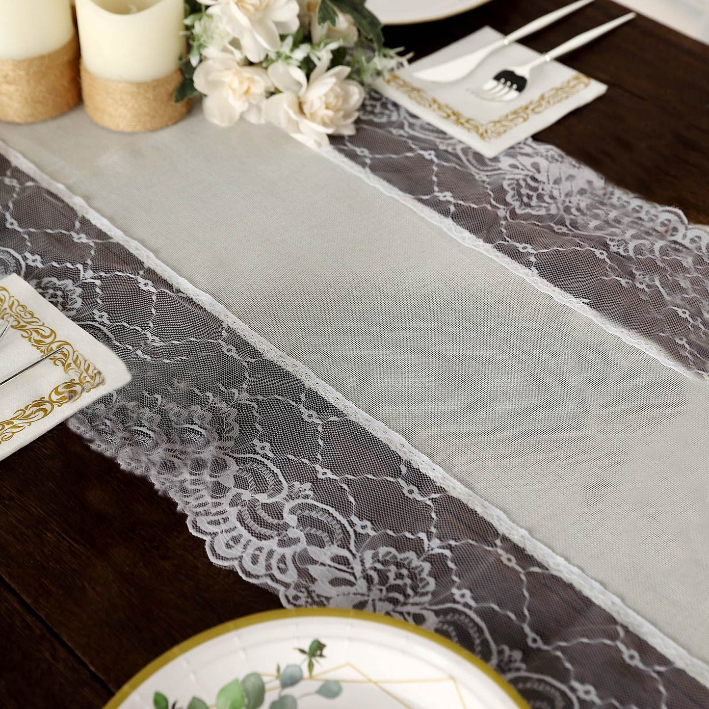 Ivory table runner with white lace edging on a rustic dining table.