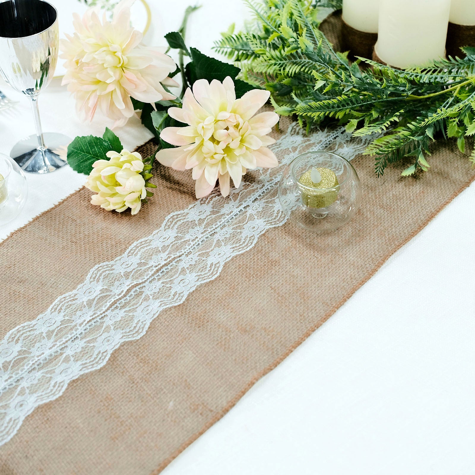 Natural jute burlap table runner with white lace, perfect for boho chic decor.