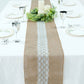 Natural jute burlap table runner with white lace, perfect for rustic decor.