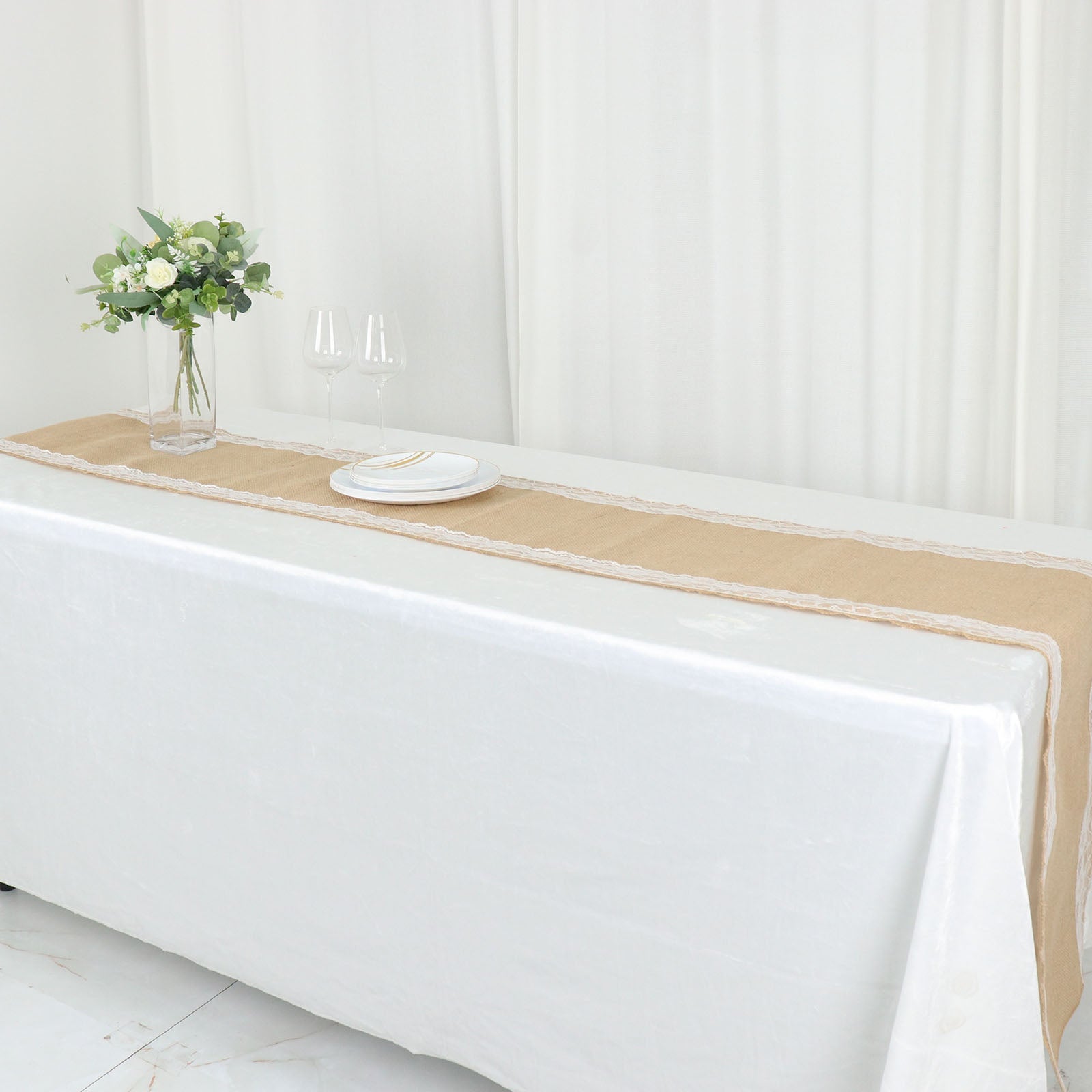 Natural jute burlap table runner with white lace trim, boho chic rustic decor.