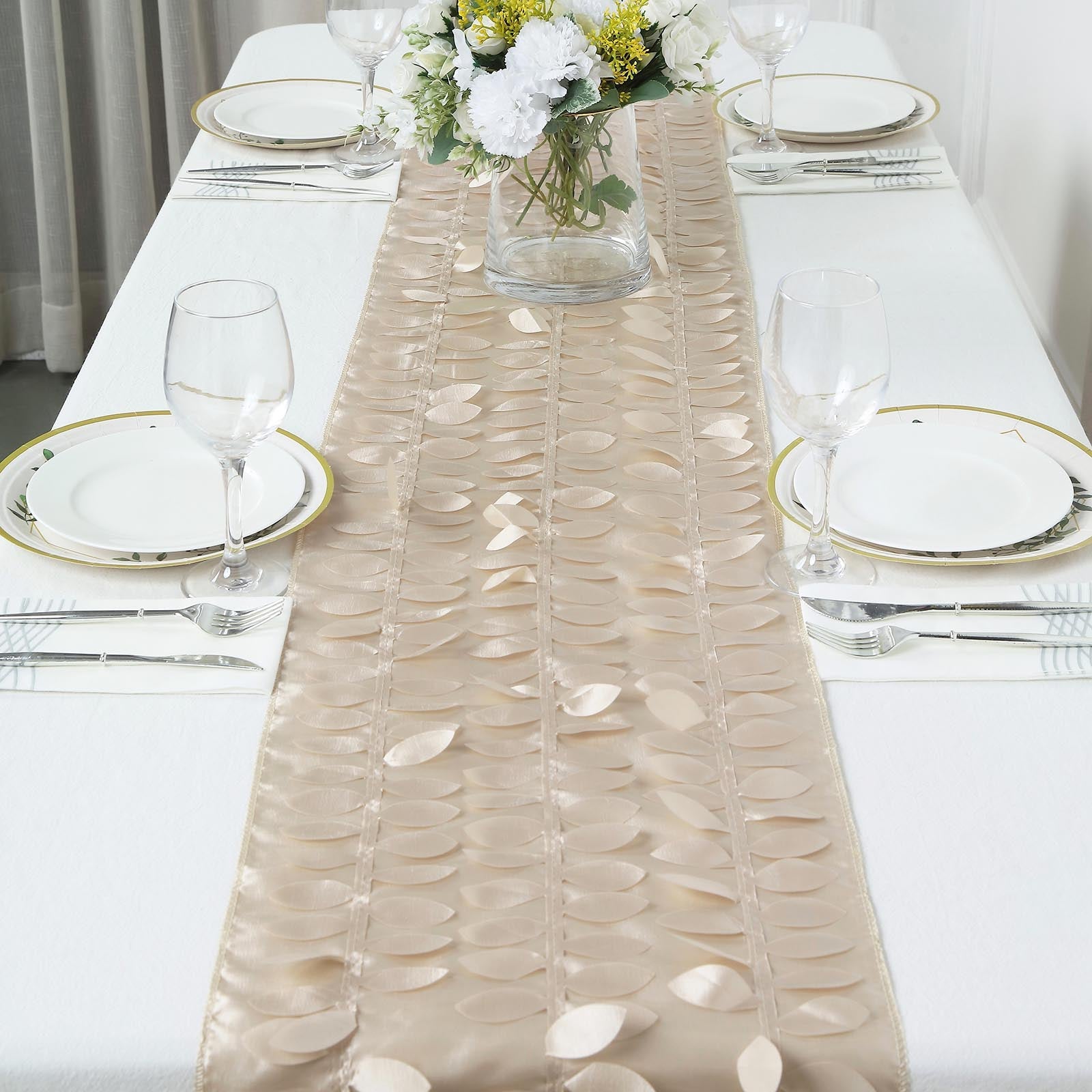 Beige 3D leaf petal taffeta fabric table runner on a dining table.