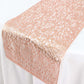 Metallic rose gold non-slip plastic woven vinyl table runner on a white table.