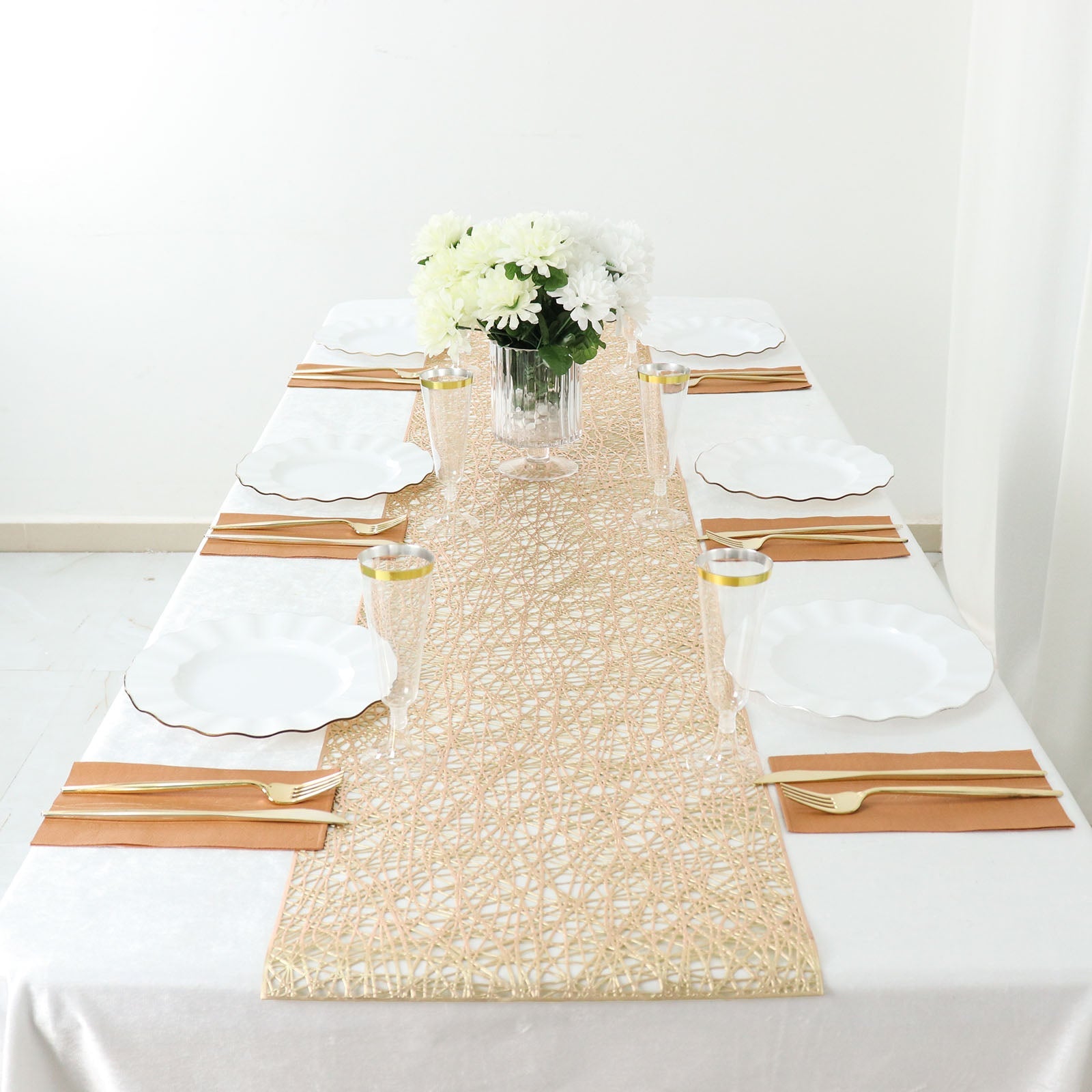 Metallic gold non-slip woven vinyl table runner on a dining table.