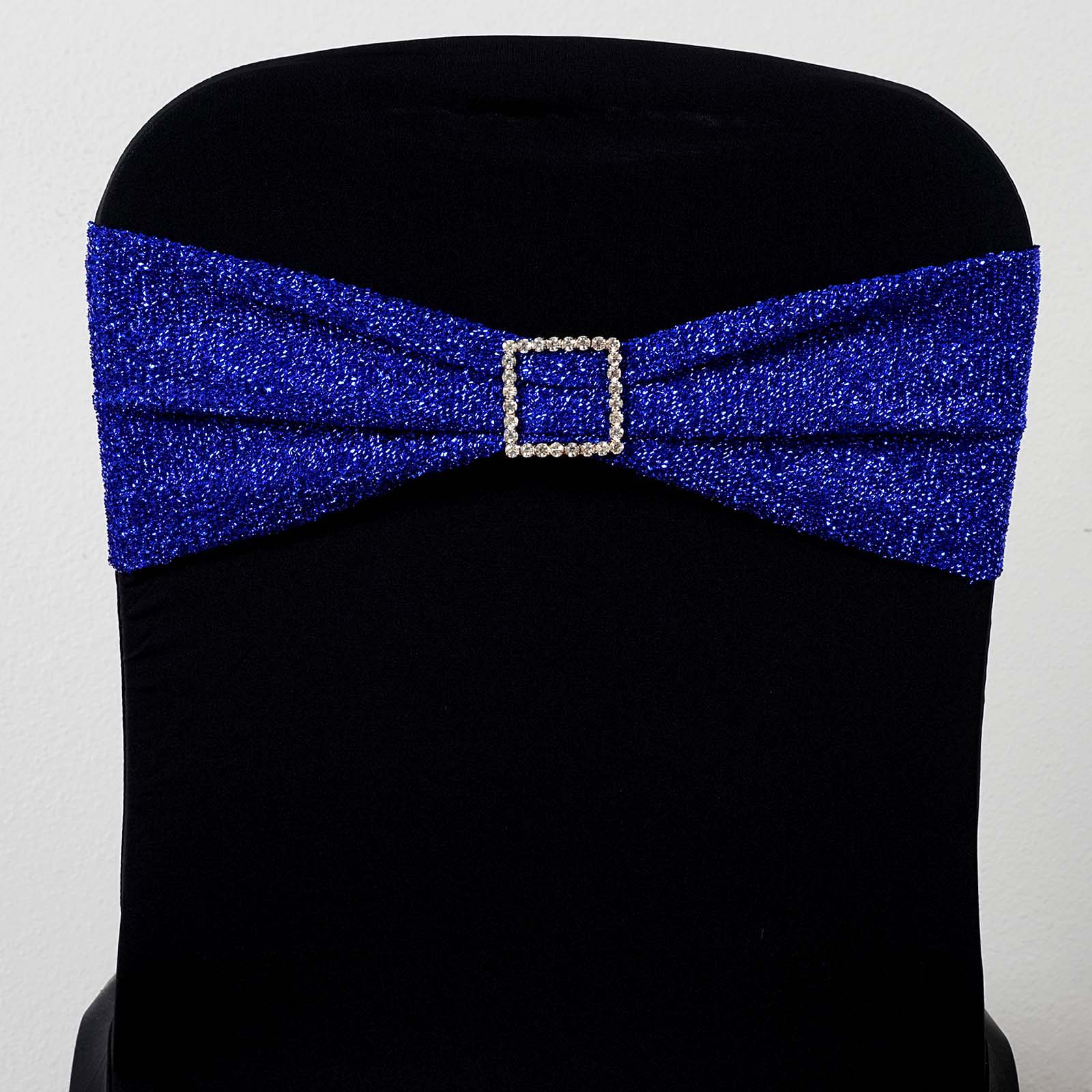 Royal Blue Metallic Shimmer Tinsel Spandex Chair Sash on a black chair.