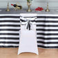 Black and white stripe satin chair sash on a white chair.