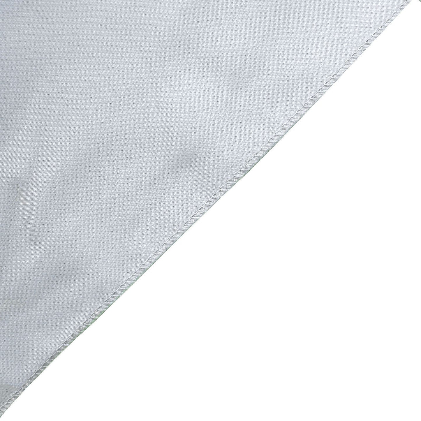 Silver chiffon table runner on a white surface.