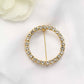 Gold rhinestone circle metal chair sash band buckle brooch.
