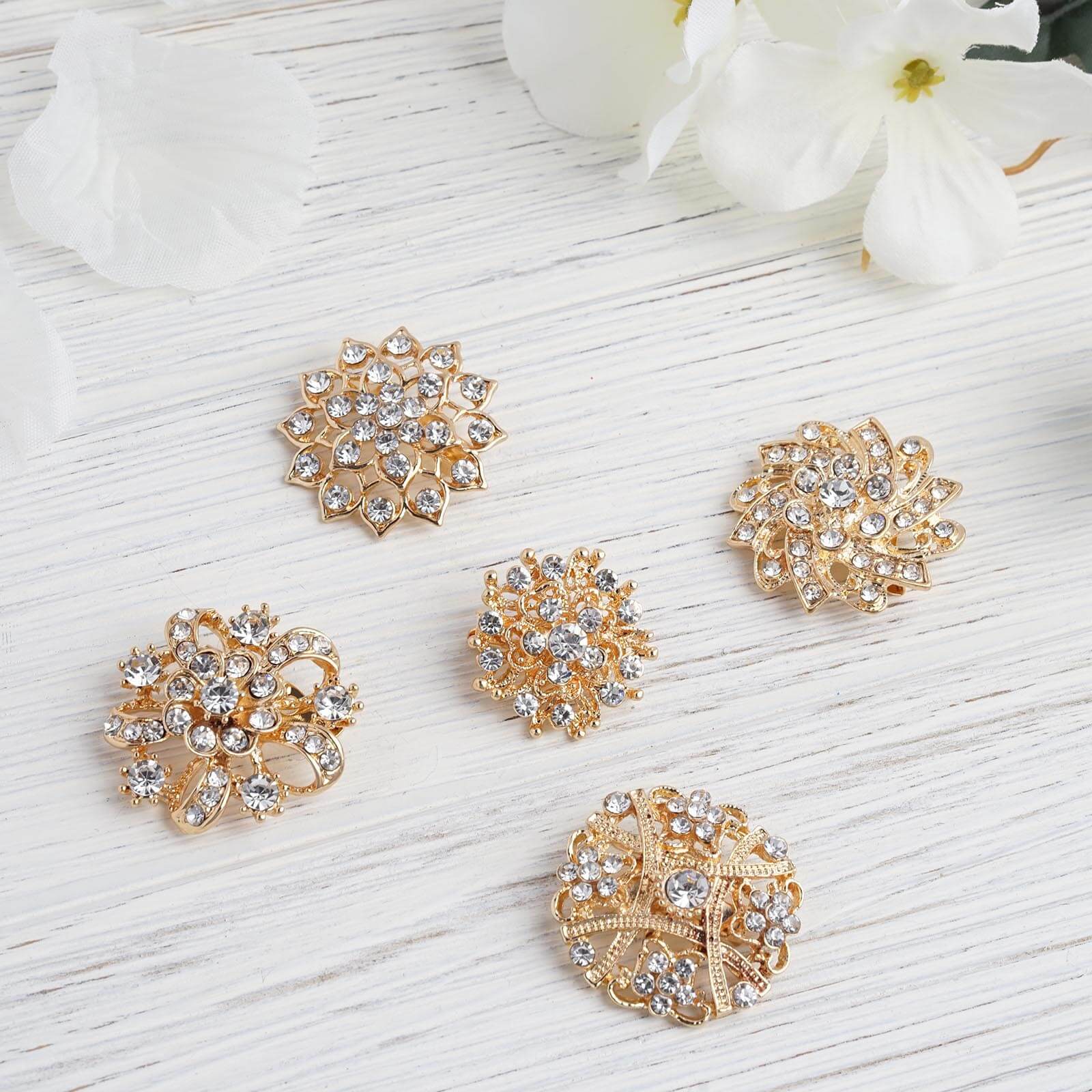 Gold plated mandala crystal rhinestone brooches for floral decor.