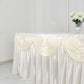Ivory pleated satin table skirt draped elegantly on a table.
