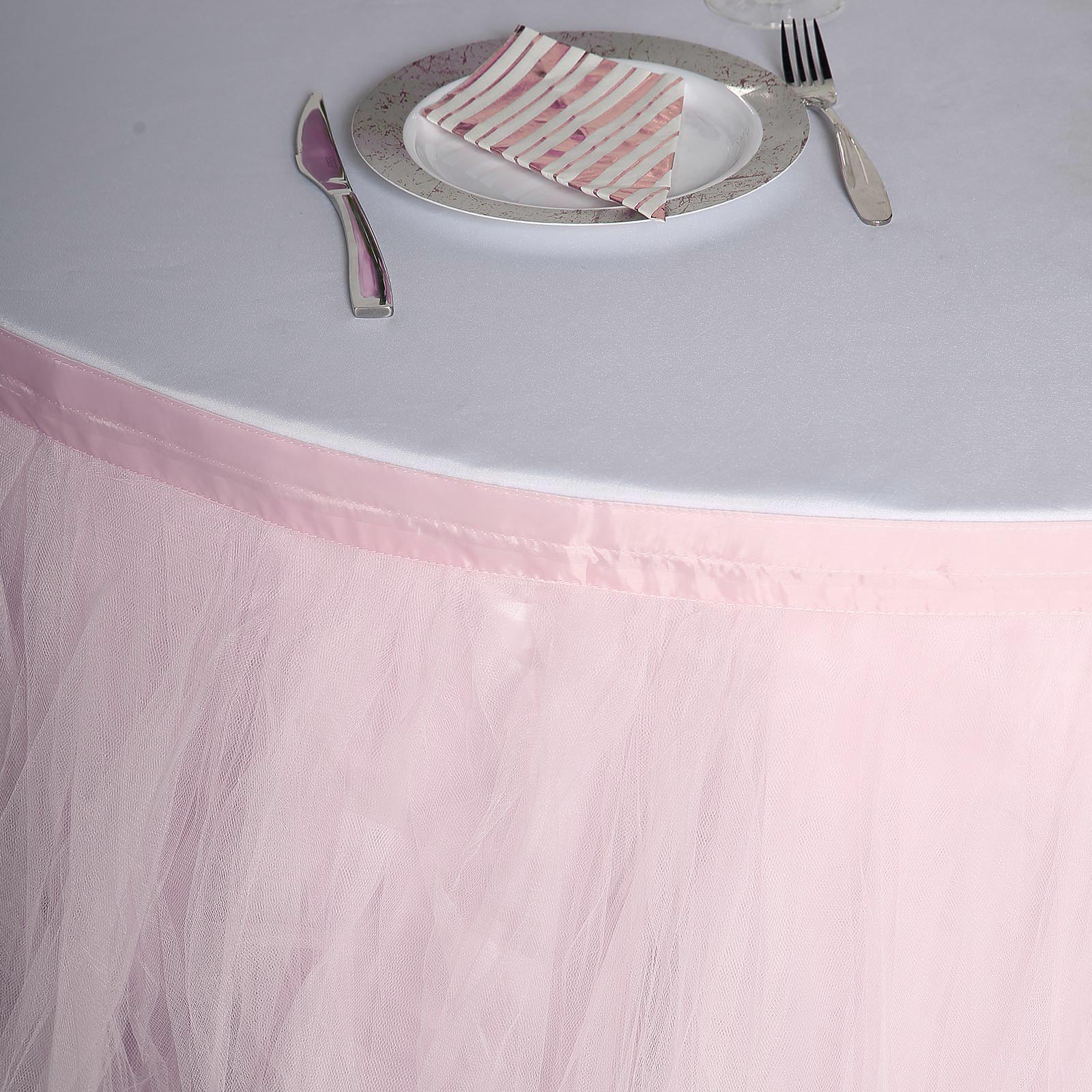 Blush 14ft 4-layer tulle tutu pleated table skirt on a round table.