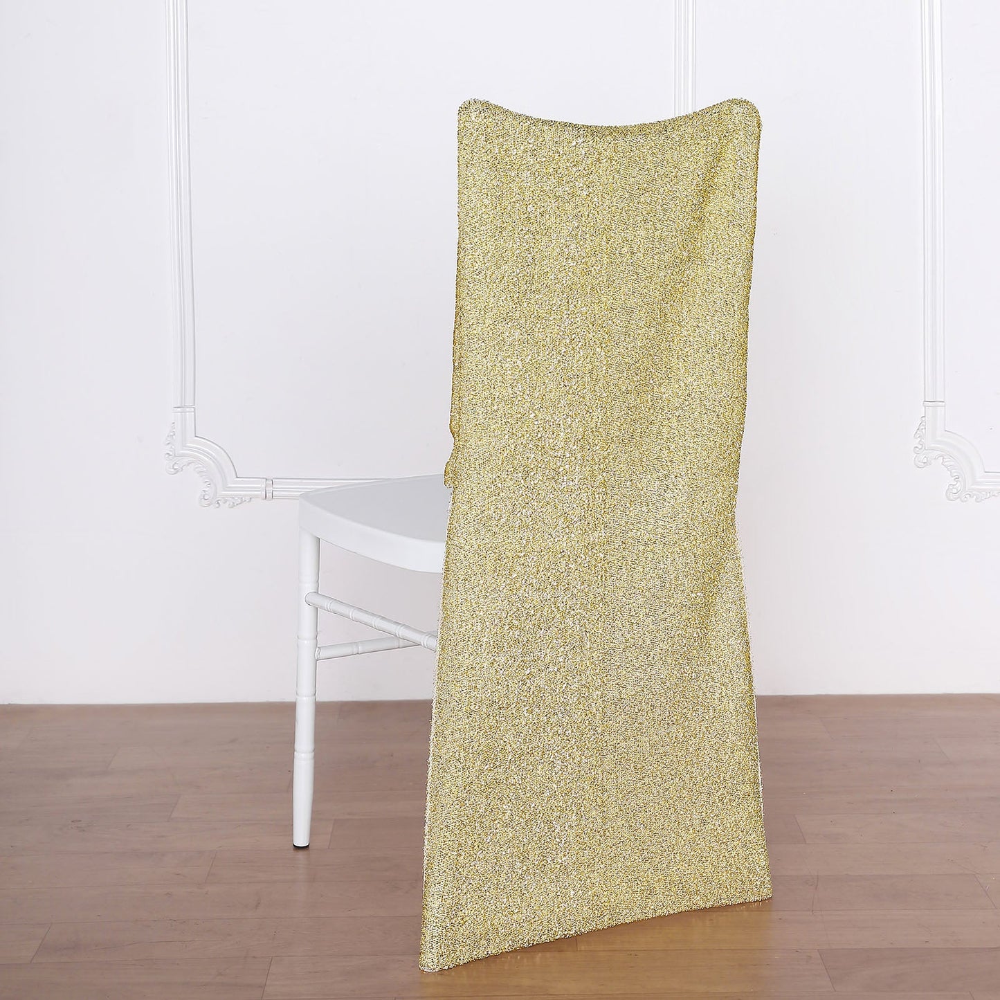 Champagne metallic shimmer tinsel spandex stretch chair slipcover on white chair.