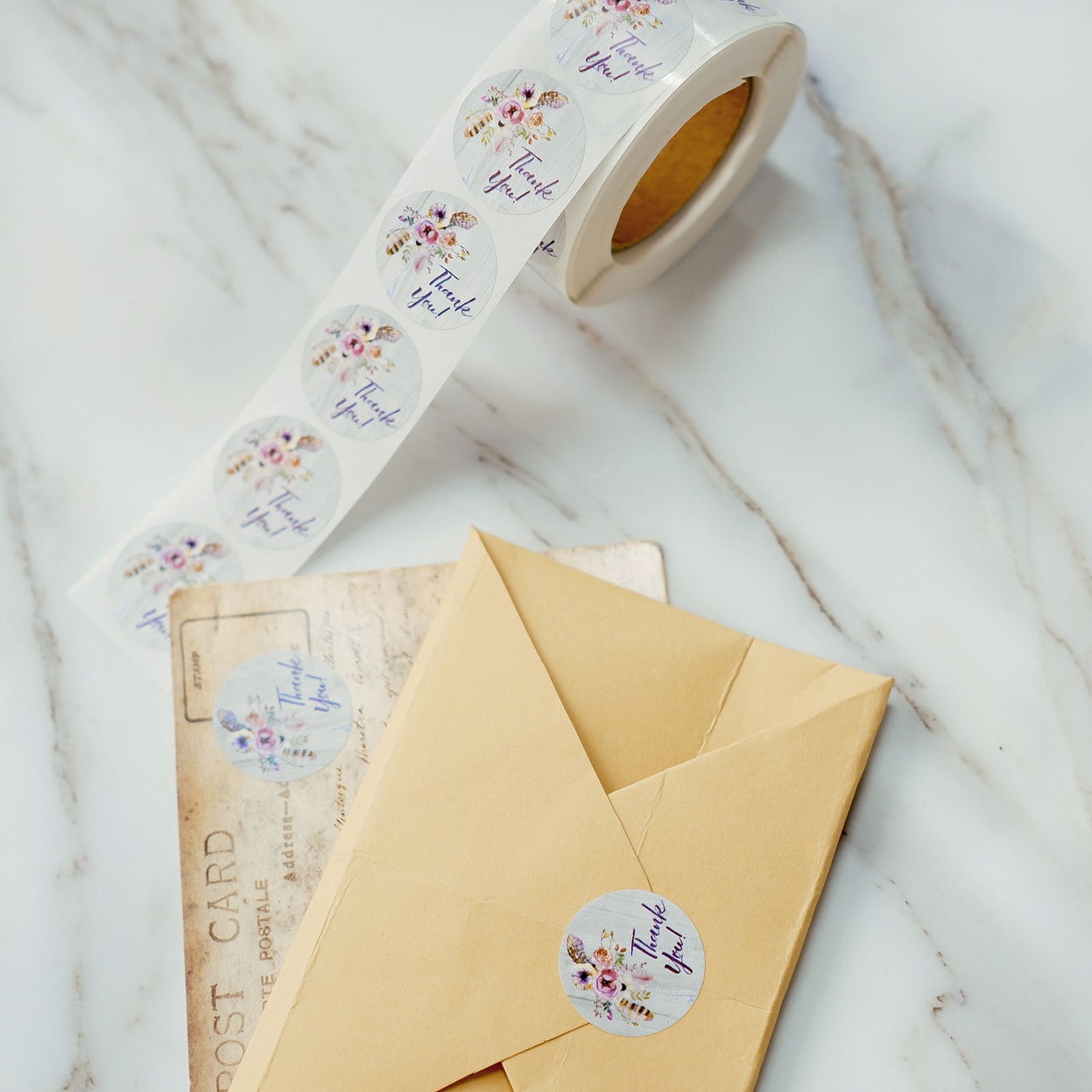 Rustic floral boho chic round thank you stickers on a DIY envelope seal.