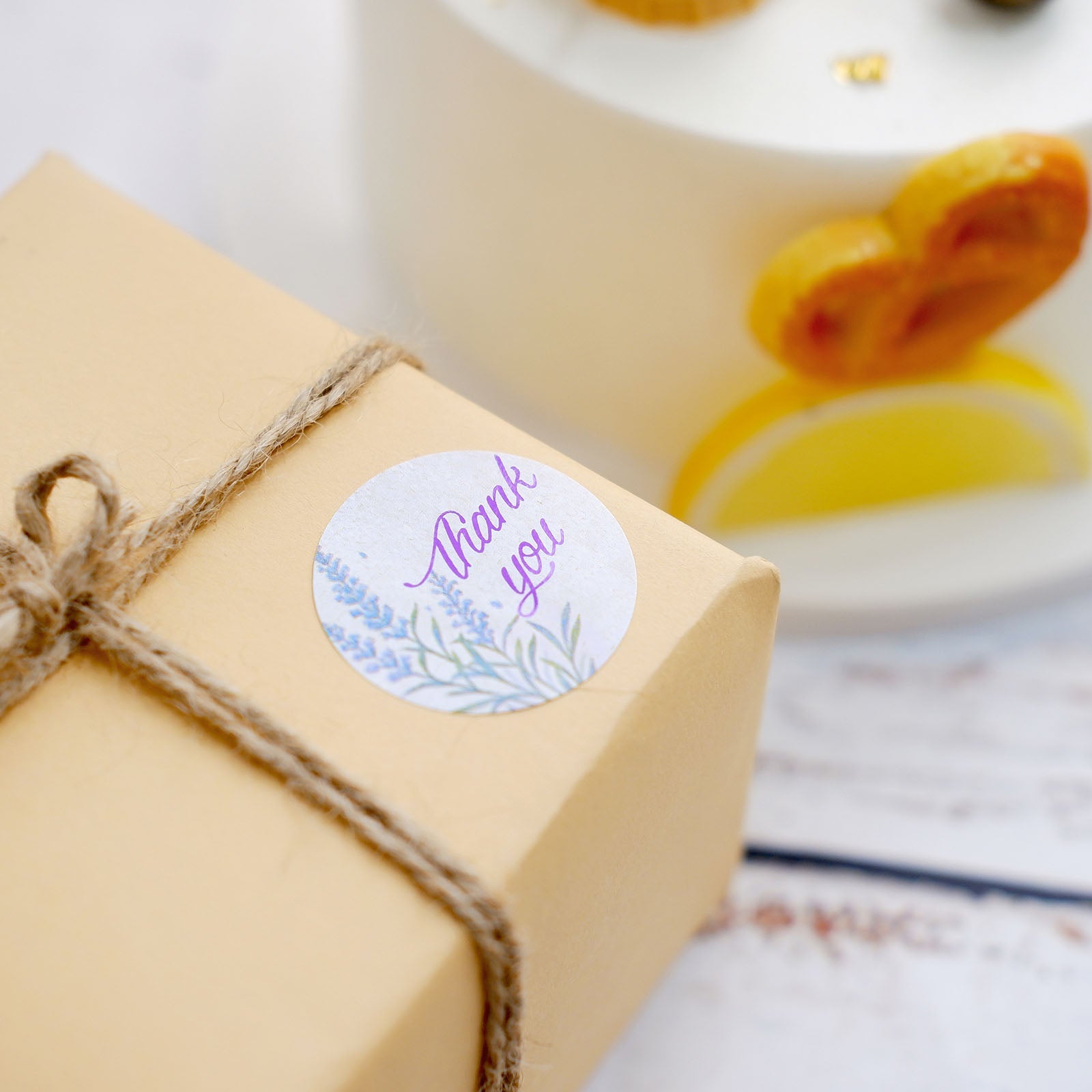 Thank you purple lavender print sticker on a gift box.