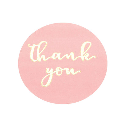 Thank you gold foil text on pink round sticker for DIY envelopes.