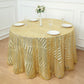 Gold sequin round tablecloth with geometric design on a dining table.
