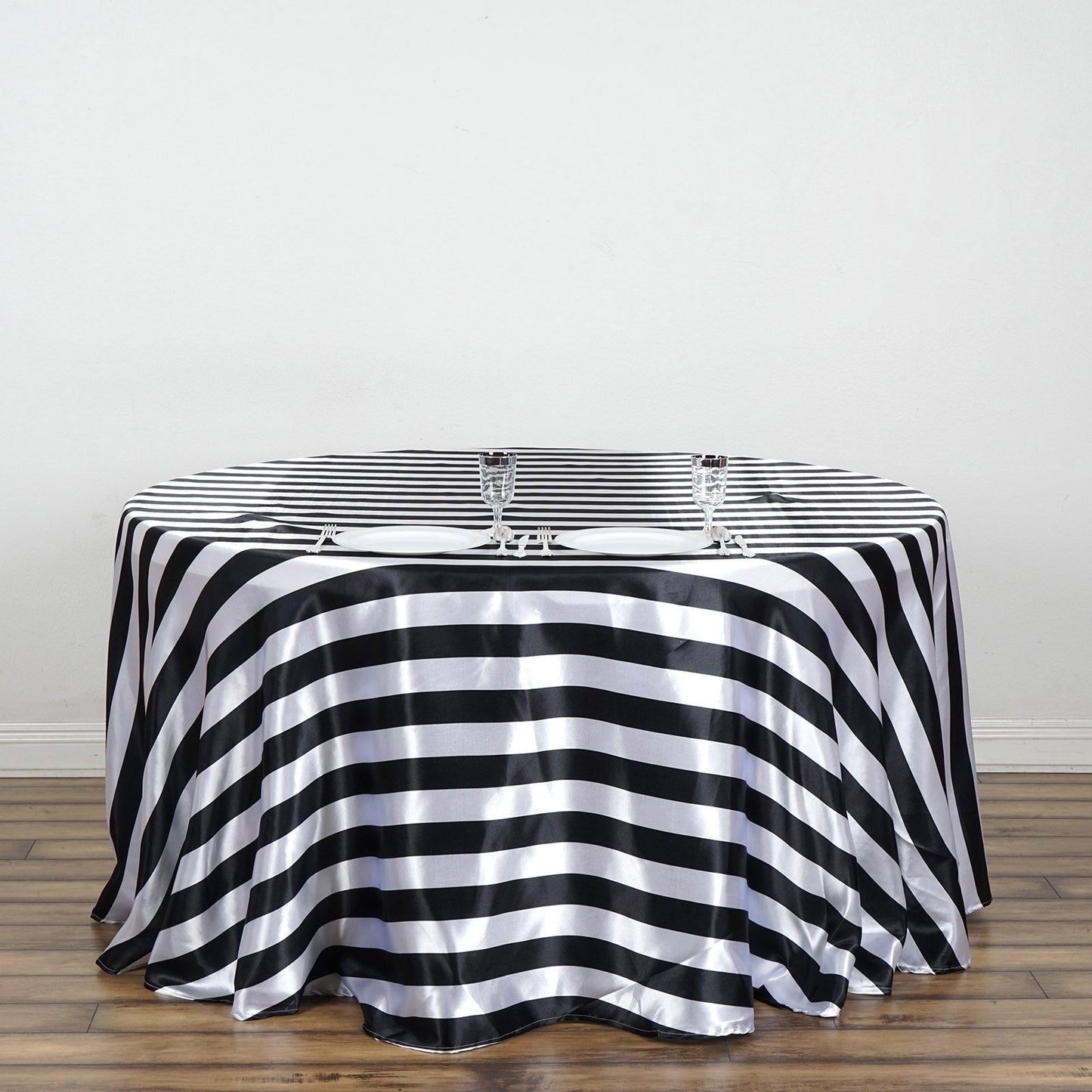Black and white striped satin round tablecloth.