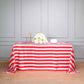 Red and white striped satin tablecloth on a rectangular table.