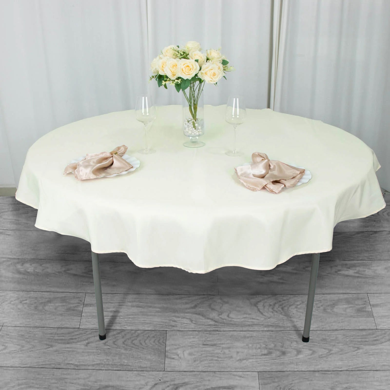 70inch Ivory 200 GSM Seamless Premium Polyester Round Tablecloth