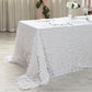 White sequin rectangle tablecloth on a dining table.