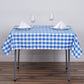 White and blue buffalo plaid square overlay tablecloth.