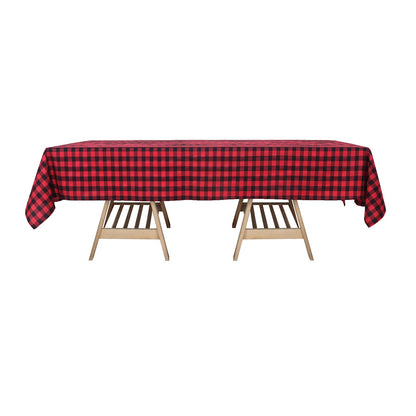 Black/Red Buffalo Plaid Rectangle Tablecloth on a wooden table.