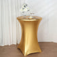 Gold fitted round cocktail table cover on a highboy table.