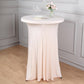 Blush round cocktail table cover with natural wavy drapes.